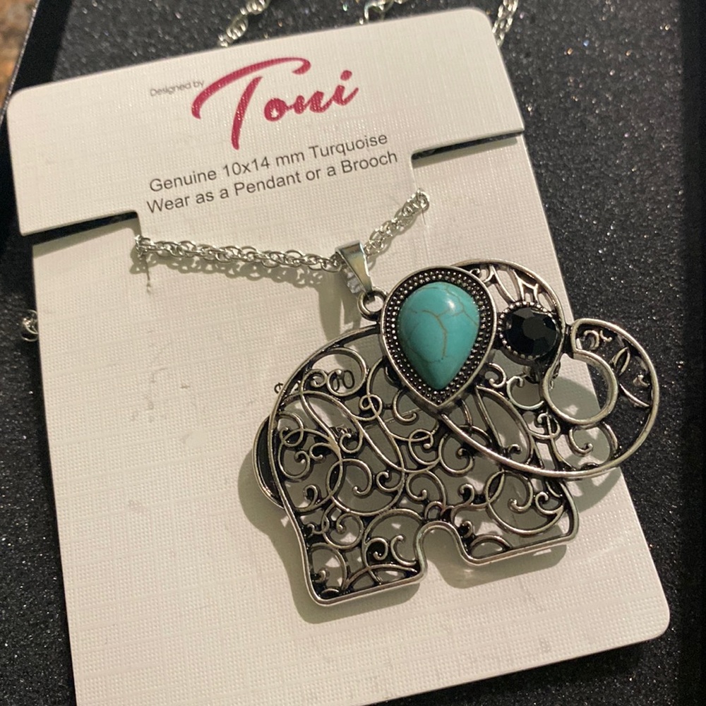 Silver tone with turquoise, elephant pendant necklace